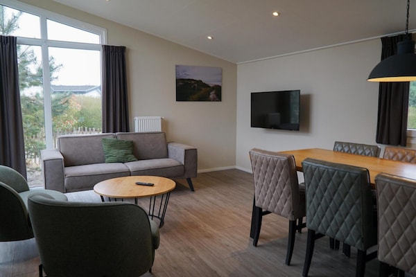 Foto van Familielodge Parc du Soleil met veranda - Vakantiehuis in Noordwijk - LivingRoom