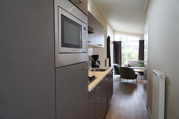 Foto van Familielodge Parc du Soleil met veranda - Vakantiehuis in Noordwijk - Kitchen