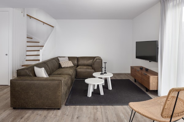 Foto van Comfortabele villa in het Veerse Meer - Vakantiehuis in Wolphaartsdijk - LivingRoom