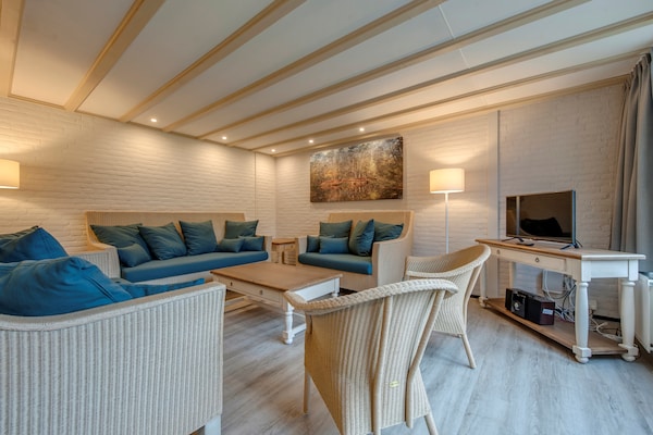 Foto van Bungalow in Nederland met Tuinterras - Vakantiehuis in Arcen - LivingRoom