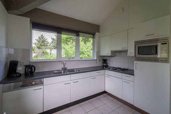 Foto van Comfortabel verblijf in een bungalow aan het water - Kitchen