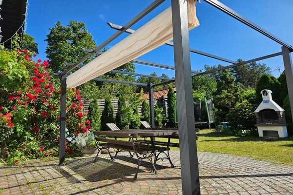 Foto van Comfortabele vakantievilla met een eigen tuin - Vakantiehuis in Pluski - TerraceBalcony