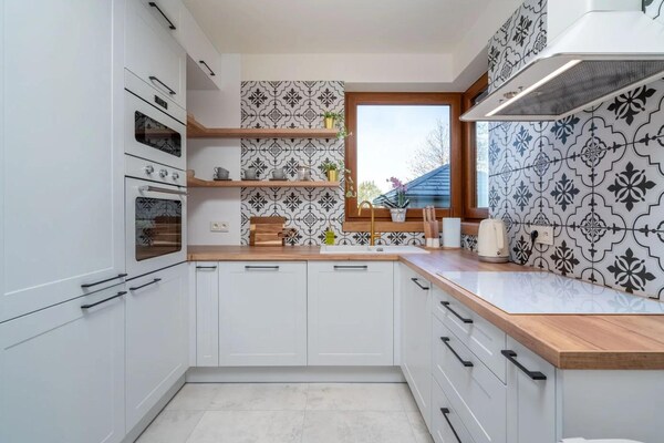 Foto van Comfortabele vakantievilla met sauna en jacuzzi - Vakantiehuis in Marcyporeba - Kitchen
