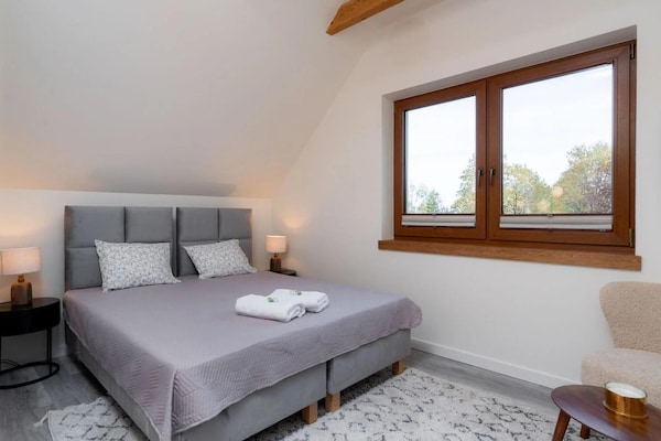 Foto van Comfortabele vakantievilla met sauna en jacuzzi - Vakantiehuis in Marcyporeba - BedRoom