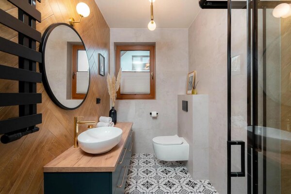 Foto van Comfortabele vakantievilla met sauna en jacuzzi - Vakantiehuis in Marcyporeba - BathRoom