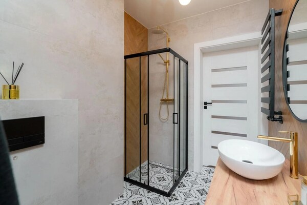 Foto van Comfortabele vakantievilla met sauna en jacuzzi - Vakantiehuis in Marcyporeba - BathRoom