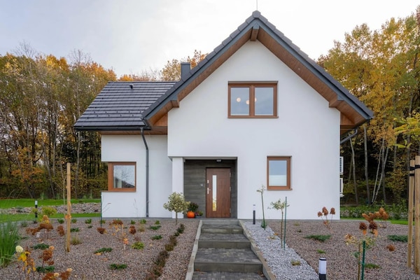 Foto van Comfortabele vakantievilla met sauna en jacuzzi - Vakantiehuis in Marcyporeba - ExteriorSummer