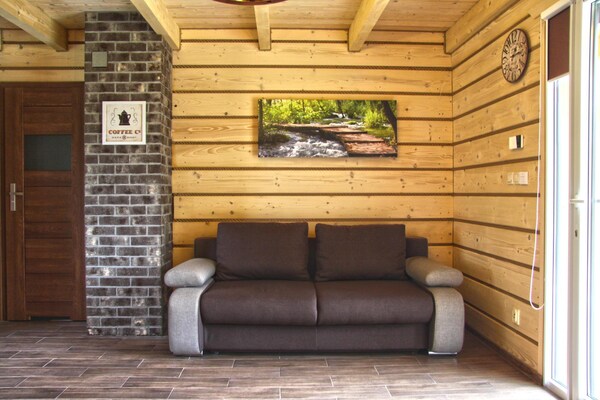 Foto van Comfortabele vakantiehuizen met open haard - Vakantiehuis in Lubrza - LivingRoom