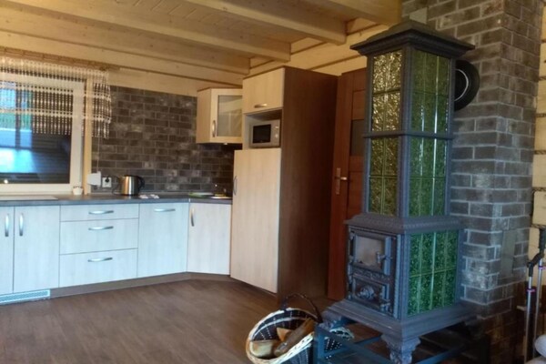 Foto van Comfortabele vakantiehuizen met open haard - Vakantiehuis in Lubrza - Kitchen