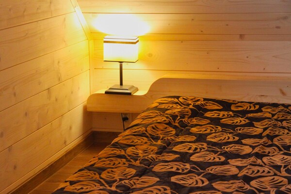 Foto van Comfortabele vakantiehuizen met open haard - Vakantiehuis in Lubrza - BedRoom