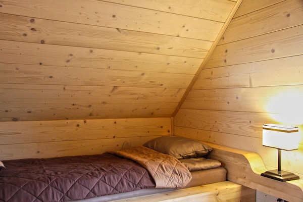 Foto van Comfortabele vakantiehuizen met open haard - Vakantiehuis in Lubrza - BedRoom