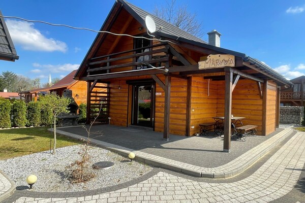 Foto van Comfortabele vakantiehuizen met open haard - Vakantiehuis in Lubrza - ExteriorSummer