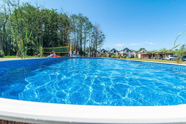 Foto van Comfortabele vakantiehuizen, zomerzwembad, sauna - Vakantiehuis in Niechorze - ExteriorSummer
