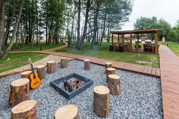 Foto van Comfortabele vakantiehuizen, zomerzwembad, sauna - Vakantiehuis in Niechorze - ExteriorSummer