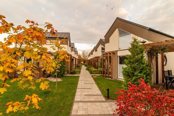 Foto van Comfortabele vakantiehuizen, zomerzwembad, sauna - Vakantiehuis in Niechorze - ExteriorSummer