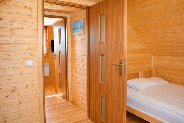 Foto van Comfortabele huizen met een spa-zone - Vakantiehuis in Wrzosowo - BedRoom