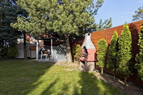 Foto van Vakantiehuis in Międzywodzie bij Strand - Vakantiehuis in Międzywodzie - GardenSummer
