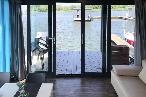 Foto van Huis in Dziwnów aan het water - Vakantiehuis in Dziwnów - LivingRoom