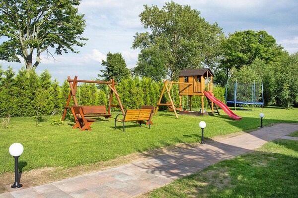 Foto van Comfortabele vakantiehuizen, bad, jacuzzi, sauna - Vakantiehuis in Osieki - GardenSummer