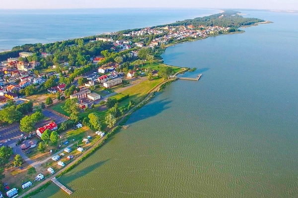 Foto van Comfortabele vakantiehuizen, bad, jacuzzi, sauna - Vakantiehuis in Osieki - WaterView