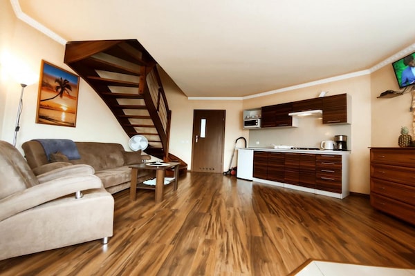 Foto van Comfortabele vakantiehuizen, bad, jacuzzi, sauna - Vakantiehuis in Osieki - LivingRoom