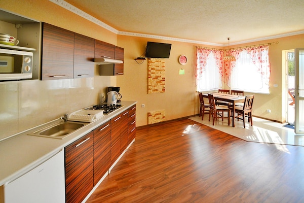 Foto van Comfortabele vakantiehuizen, bad, jacuzzi, sauna - Vakantiehuis in Osieki - Kitchen