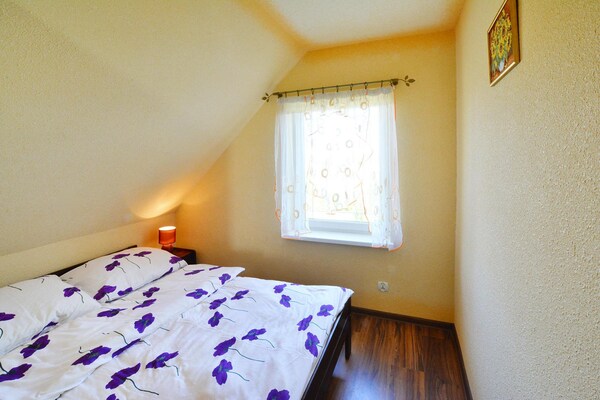 Foto van Comfortabele vakantiehuizen, bad, jacuzzi, sauna - Vakantiehuis in Osieki - BedRoom