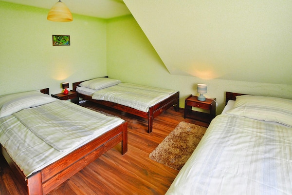 Foto van Comfortabele vakantiehuizen, bad, jacuzzi, sauna - Vakantiehuis in Osieki - BedRoom