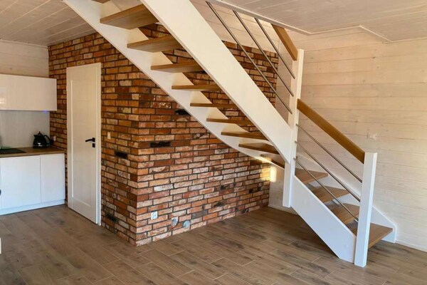 Foto van Comfortabele vakantiehuizen met zwembaden - Vakantiehuis in Mielno - Stairs