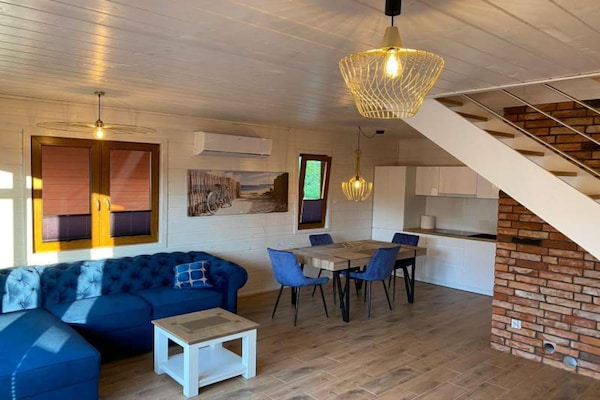 Foto van Comfortabele vakantiehuizen met zwembaden - Vakantiehuis in Mielno - LivingRoom