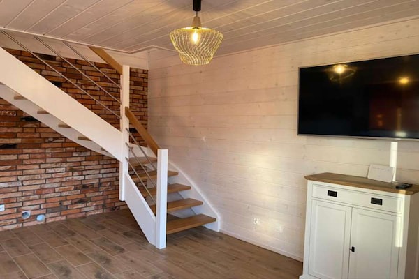 Foto van Comfortabele vakantiehuizen met zwembaden - Vakantiehuis in Mielno - LivingRoom