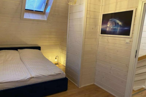 Foto van Comfortabele vakantiehuizen met zwembaden - Vakantiehuis in Mielno - BedRoom