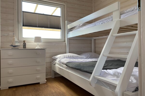Foto van Comfortabele vakantiehuizen met airconditioning. - Vakantiehuis in Dabki - BedRoom