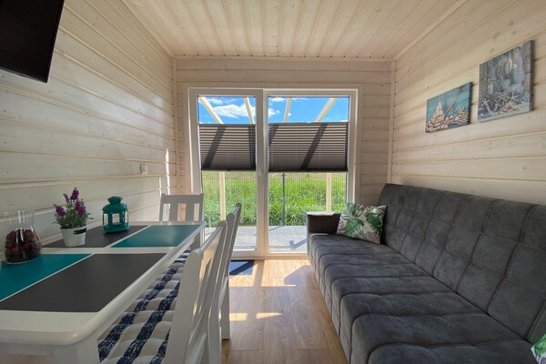 Foto van Comfortabele vakantiehuizen met airconditioning. - Vakantiehuis in Dabki - LivingRoom