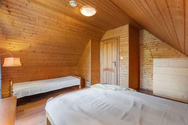 Foto van Comfortabel vakantiehuis met open haard en terras - Vakantiehuis in Bobolin - BedRoom