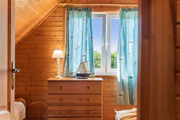 Foto van Comfortabel vakantiehuis met open haard en terras - Vakantiehuis in Bobolin - BedRoom
