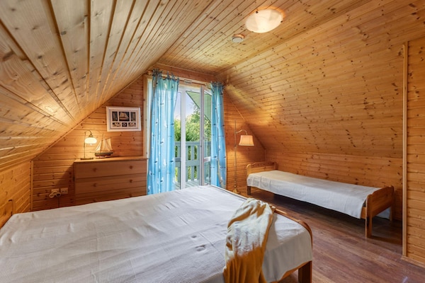 Foto van Comfortabel vakantiehuis met open haard en terras - Vakantiehuis in Bobolin - BedRoom