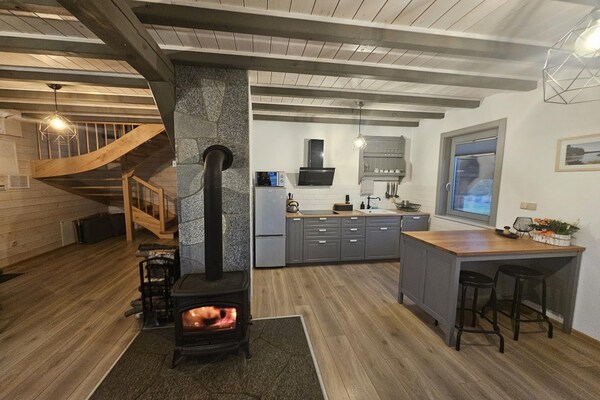 Foto van Comfortabel vakantiehuis met terras en tuin. - Vakantiehuis in Wdzydze Tucholskie - DiningRoom