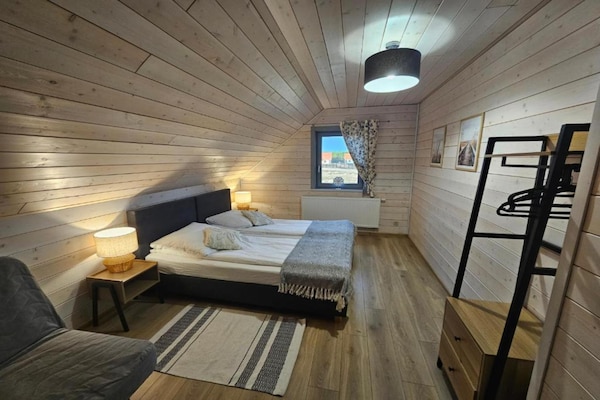 Foto van Comfortabel vakantiehuis met terras en tuin. - Vakantiehuis in Wdzydze Tucholskie - BedRoom