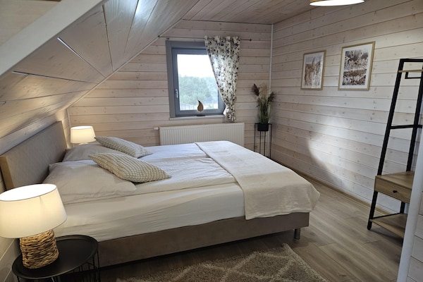 Foto van Comfortabel vakantiehuis met terras en tuin. - Vakantiehuis in Wdzydze Tucholskie - BedRoom