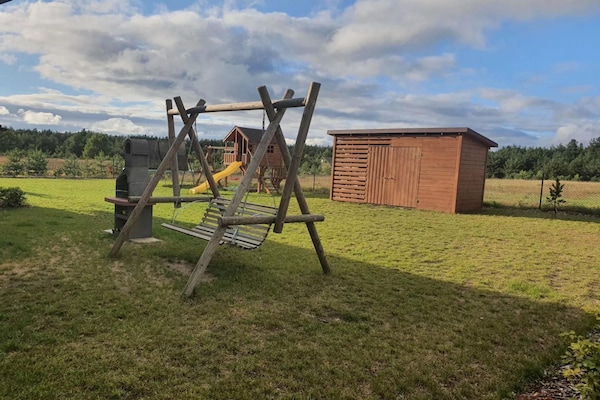 Foto van Comfortabel vakantiehuis met terras en tuin. - Vakantiehuis in Wdzydze Tucholskie - GardenSummer