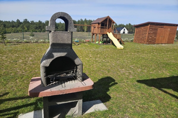 Foto van Comfortabel vakantiehuis met terras en tuin. - Vakantiehuis in Wdzydze Tucholskie - GardenSummer