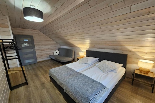Foto van Comfortabel vakantiehuis met terras en tuin. - Vakantiehuis in Wdzydze Tucholskie - BedRoom