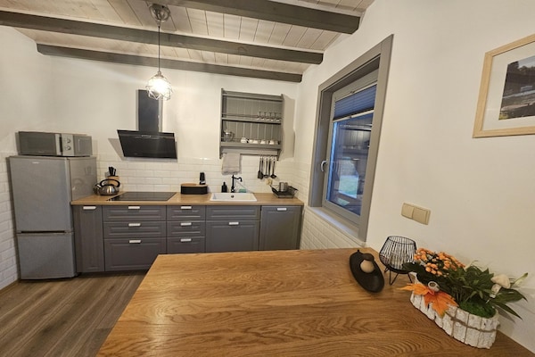 Foto van Comfortabel vakantiehuis met terras en tuin. - Vakantiehuis in Wdzydze Tucholskie - Kitchen