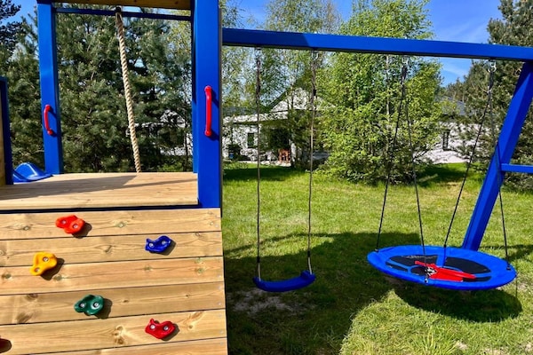 Foto van Comfortabel vakantiehuis met zwembad, sauna - Vakantiehuis in Odargowo - GardenSummer