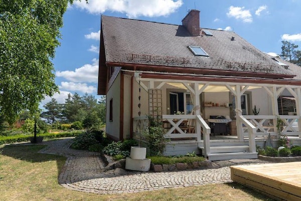 Foto van Vakantievilla voor 10 personen met privézwembad - Vakantiehuis in Kielno - ExteriorSummer