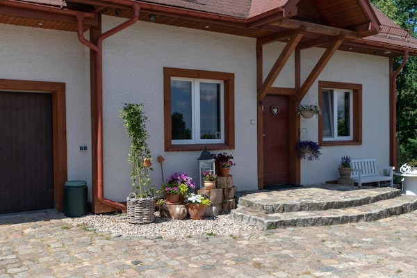 Foto van Vakantievilla voor 10 personen met privézwembad - Vakantiehuis in Kielno - ExteriorSummer