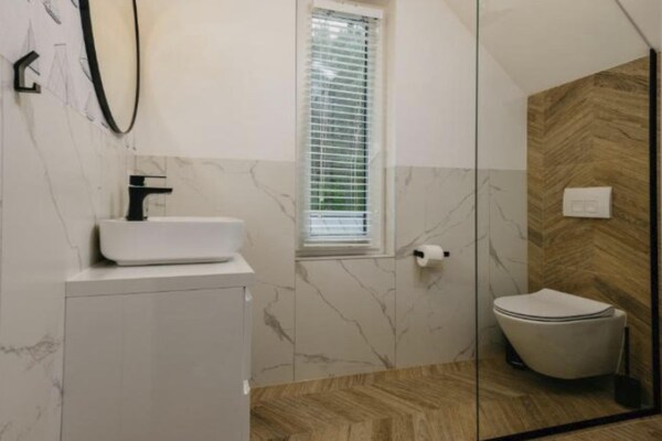 Foto van Comfortabel vakantiehuis met sauna en jacuzzi. - Vakantiehuis in Kopalino - BathRoom
