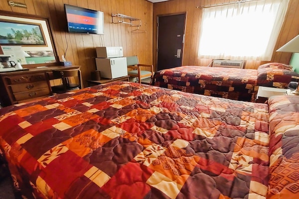 Foto van 2 Volle Bedden Met 1 Twin Bed - Vakantiehuis in International Falls - BedRoom