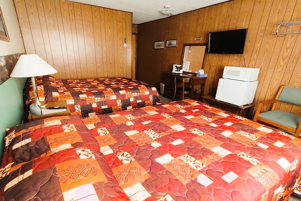 Foto van 2 Volle Bedden Met 1 Twin Bed - Vakantiehuis in International Falls - BedRoom